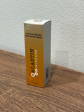 A box of Calastin Skincare C-Radical Defense Antioxidant Serum standing on a wooden surface against a textured white wall.