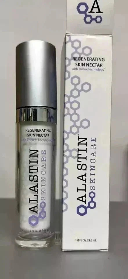 A bottle of Alastin Skincare Regenerating Skin Nectar next to its white and purple packaging box, displayed on a neutral gray background.