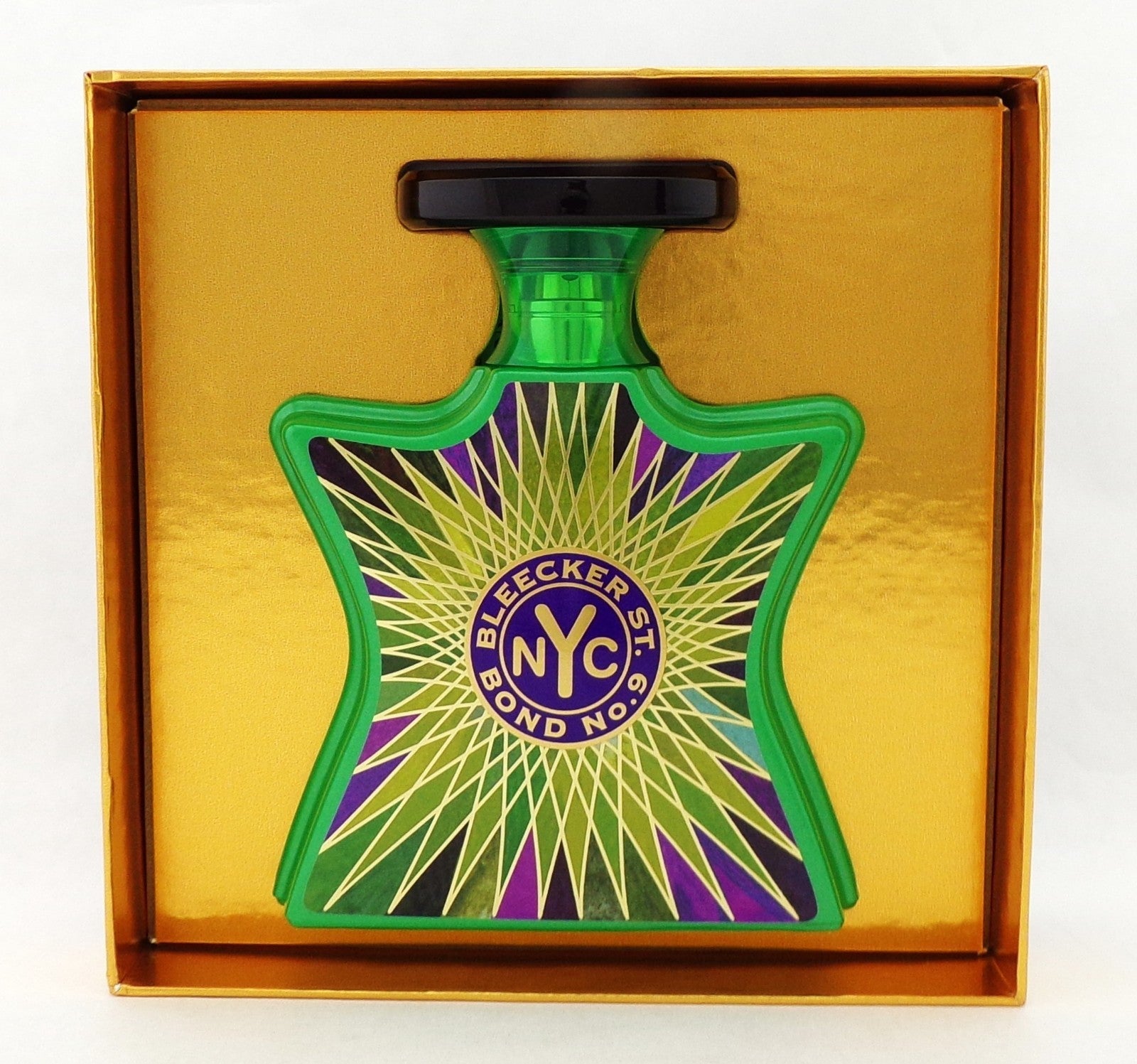 Green perfume bottle with 'Bleecker St. NYC Bond No 9' label in a gold box