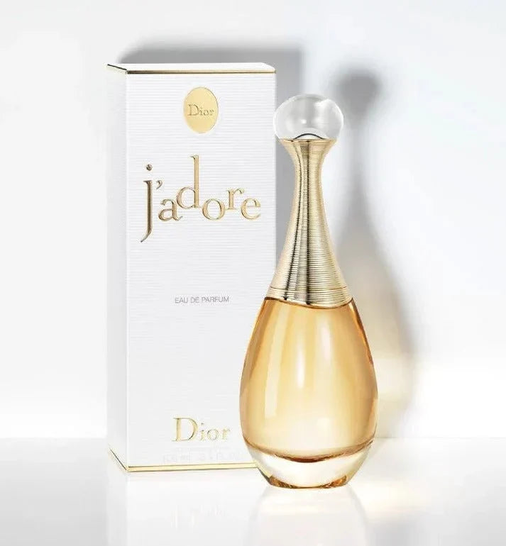 Dior j'adore perfume bottle and packaging on a white background