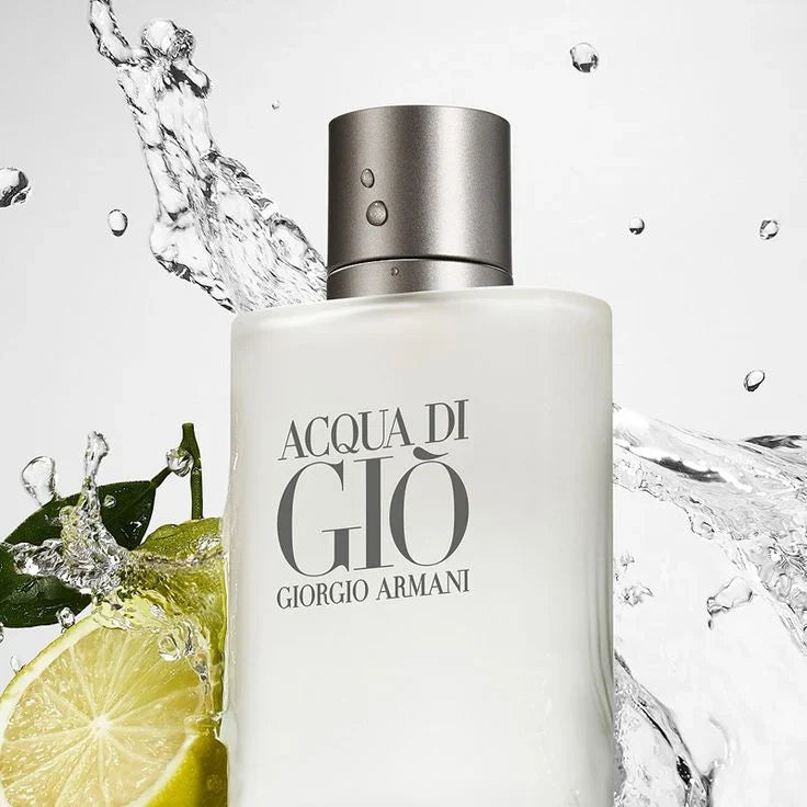 Giorgio Armani Acqua di Gio perfume bottle with water splash and lime slice on a light gray background