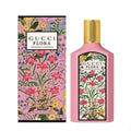 Gucci Flora perfume bottle and packaging with floral design on a white background