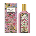Gucci Flora perfume bottle and packaging with floral design on a white background