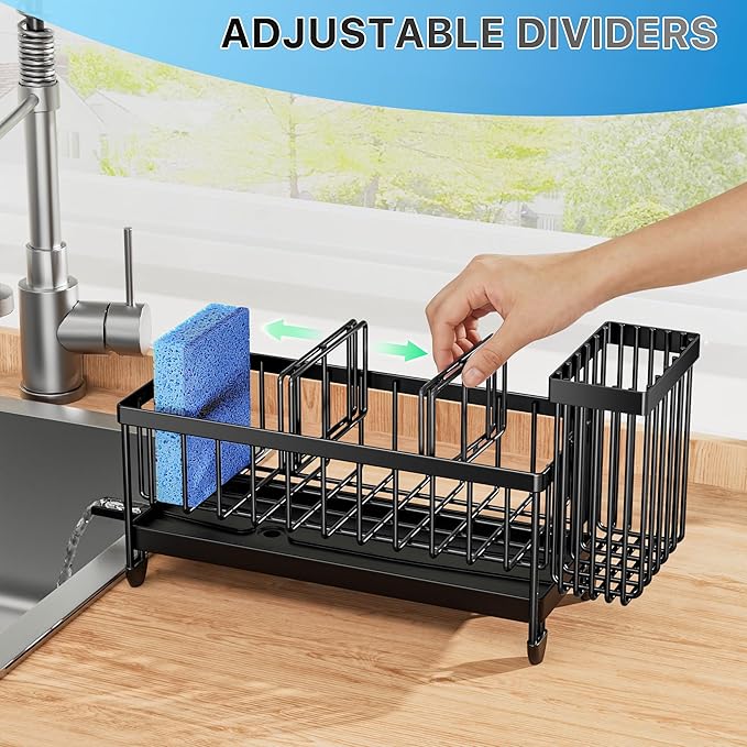 Black dish drying rack with adjustable dividers on a kitchen counter.