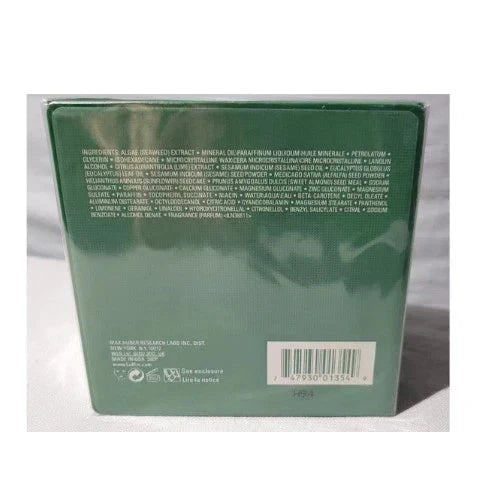 Back of a green product packaging with text and a barcode on a white background
