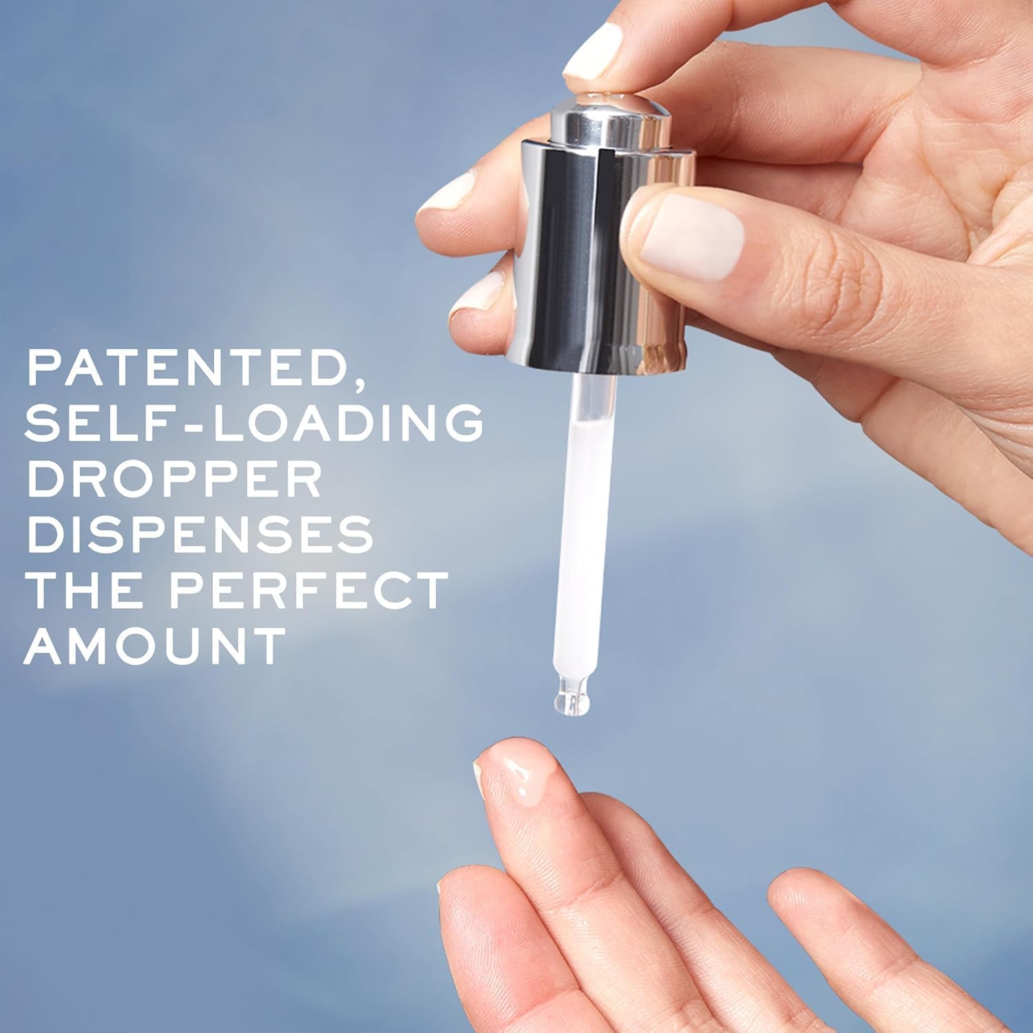 Hand holding a self-loading dropper with text on a blue background