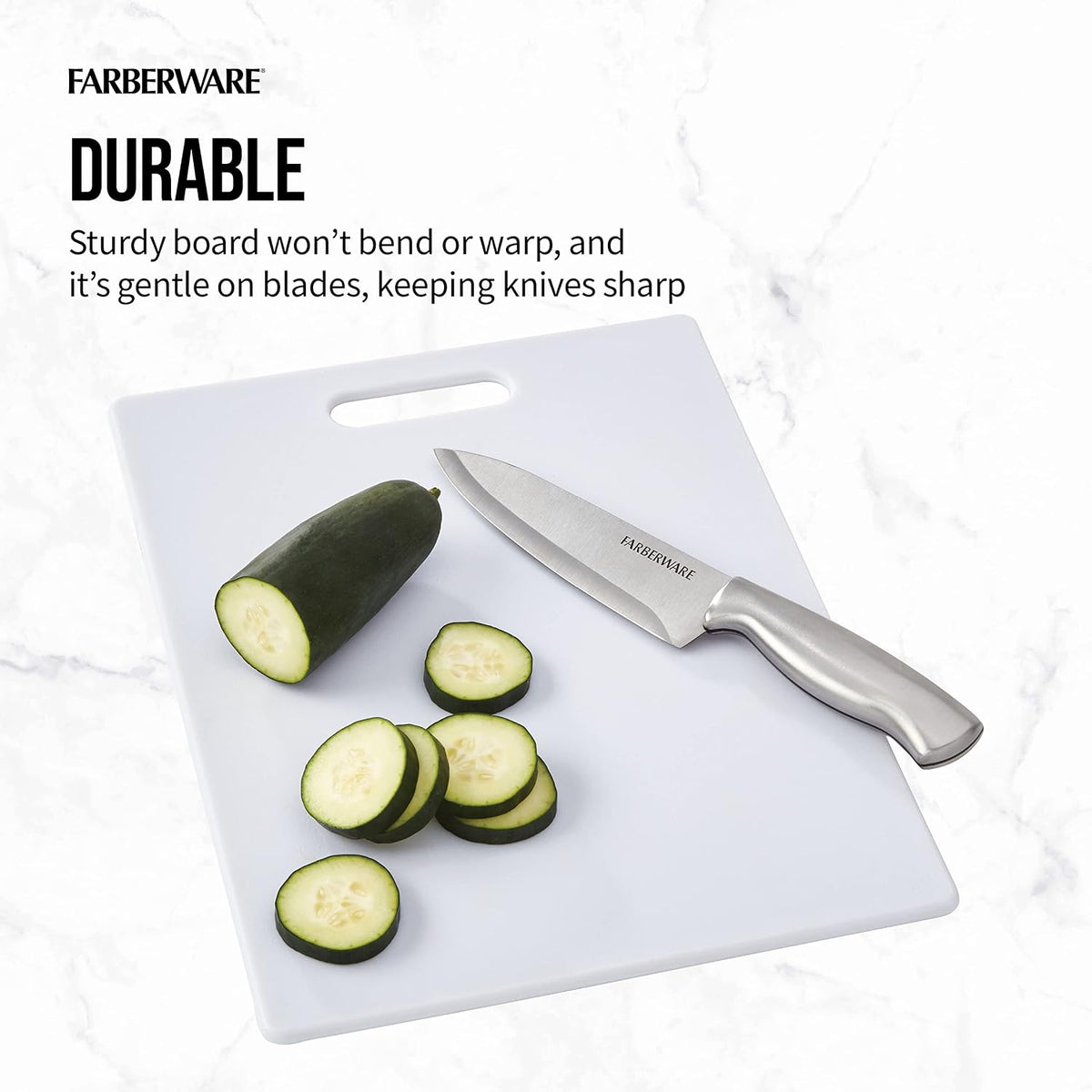 Farberware cutting board with sliced zucchini and knife on a white background