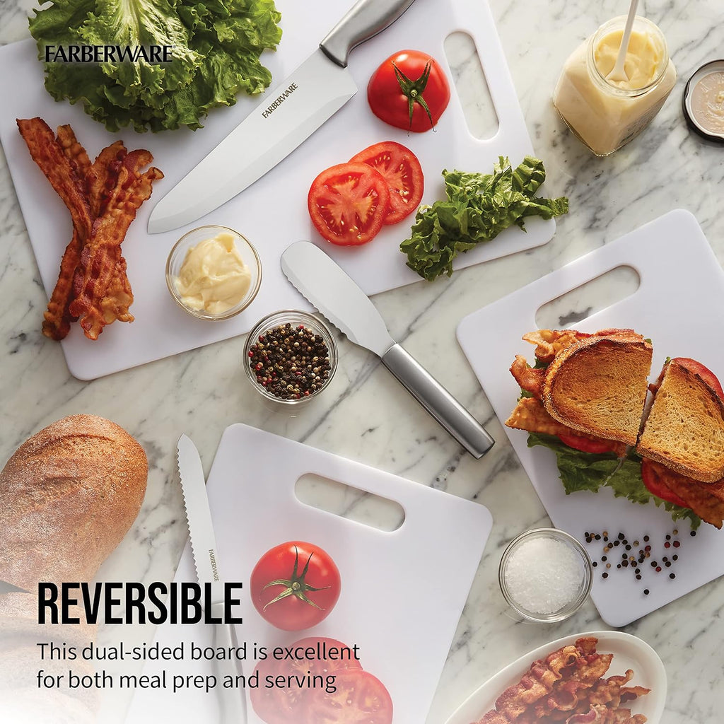 Farberware reversible cutting board with food items on a marble surface