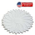 A white, flower-shaped plastic trivet or coaster with a small hole in the upper right, shown on a white background with a 'Free Shipping in the U.S.