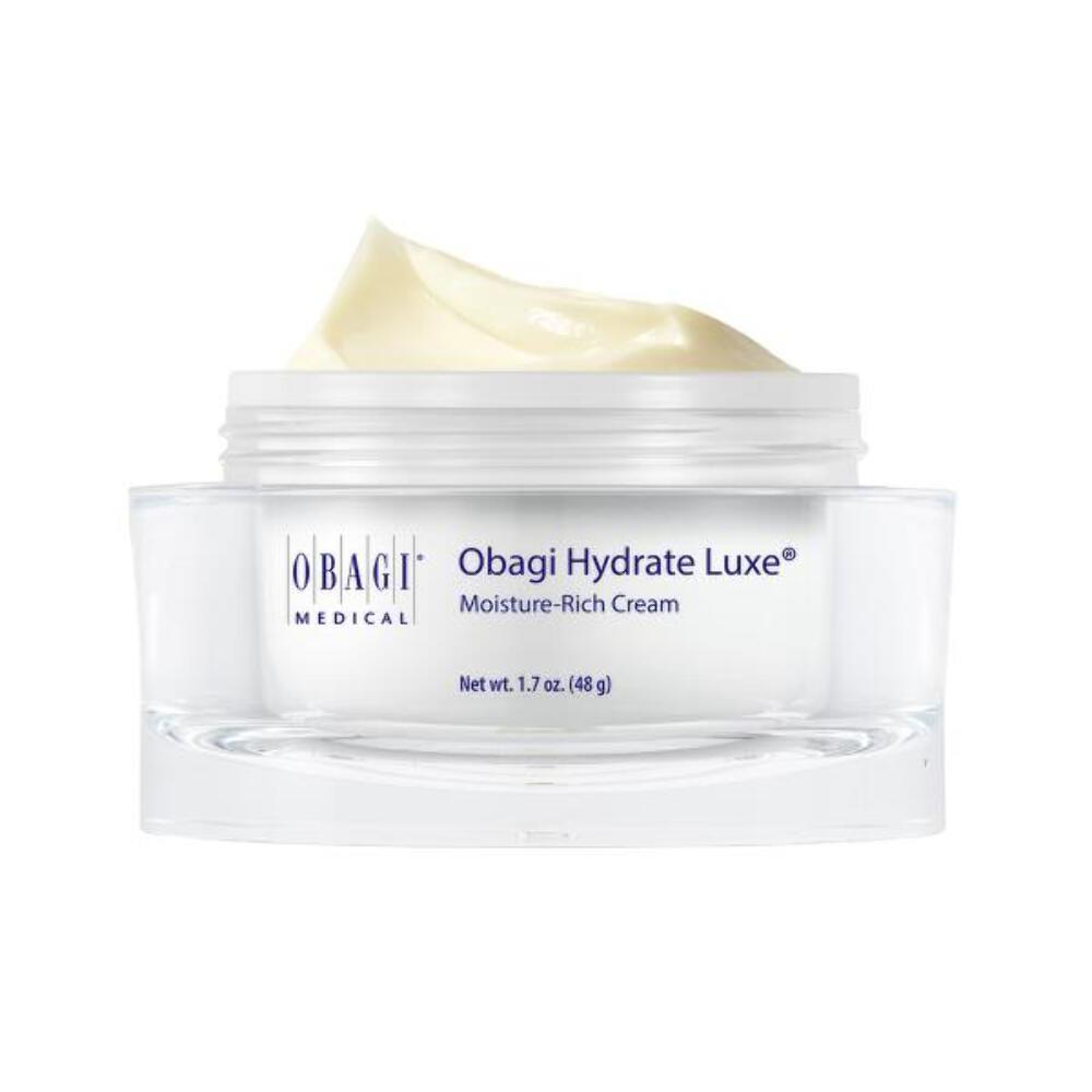 A jar of Obagi Medical Obagi Hydrate Luxe Moisture-Rich Cream with a swirl of pale yellow cream visible at the top, set against a plain white background.