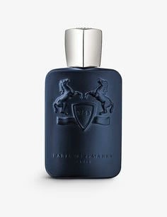 A dark navy blue rectangular perfume bottle with a silver cap, featuring an embossed crest design on the front, set against a light gray background.