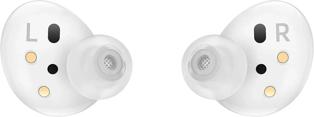 A pair of white wireless earbuds with transparent silicone tips, featuring gold and black sensor accents and L/R markings on a plain white background.