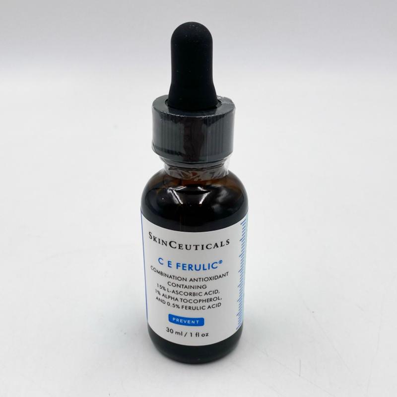 A 30 ml amber glass dropper bottle of SkinCeuticals C E Ferulic combination antioxidant serum, featuring a white label with blue text and a black dropper cap, set against a plain white background.