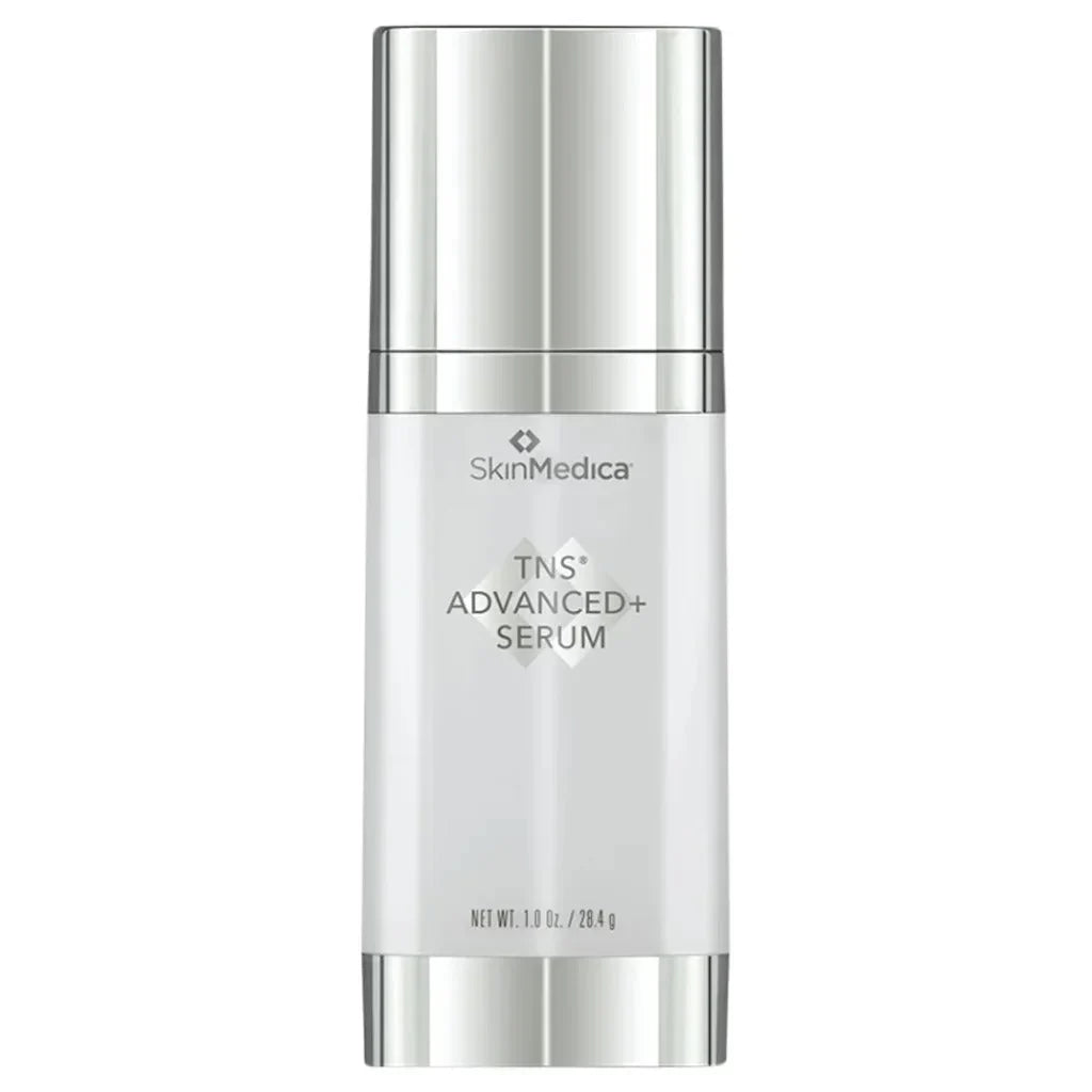 SkinMedica TNS Advanced+ Serum in a sleek, silver cylindrical bottle with a metallic cap, set against a plain white background.
