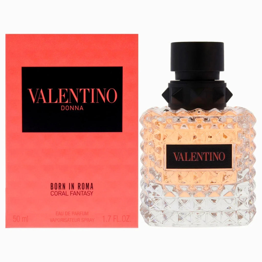 Valentino Donna Born in Roma Coral Fantasy Eau de Parfum bottle next to its coral pink packaging box, on a white background.