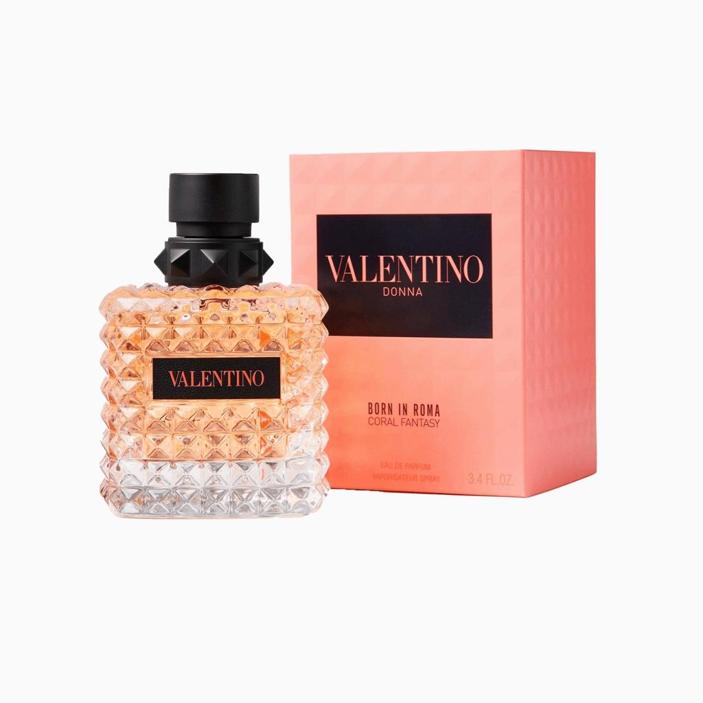 Valentino Donna Born in Roma Eau de Parfum bottle next to its signature pink box, on a clean white background.