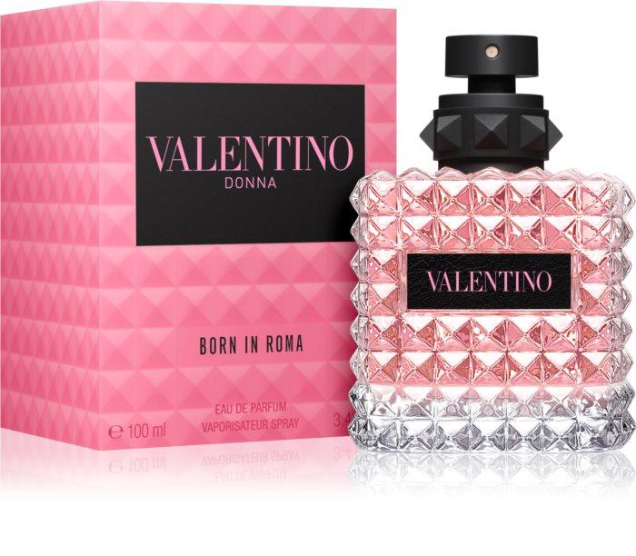 Valentino Donna Born in Roma Eau de Parfum bottle with a textured pink and clear diamond-patterned glass body, black cap, and a pink box with a black Valentino logo label.