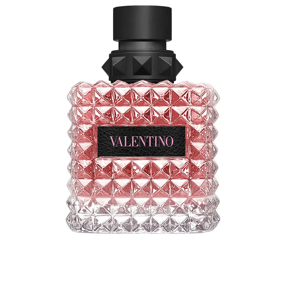 Valentino perfume bottle with black cap on a white background