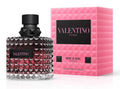 Valentino Donna Born in Roma Intense Eau de Parfum bottle next to its signature pink geometric packaging box, on a white background.