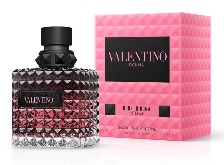 Valentino Donna Born in Roma Intense Eau de Parfum bottle next to its signature pink geometric packaging box, on a white background.